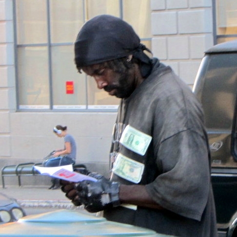 MAN READS GOSPEL TRACT IN BERKELEY